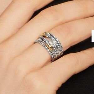 David Yurnam DOUBLE X CROSSOVER RING

Sterling Silver with 18K Yellow Gold, 13mm